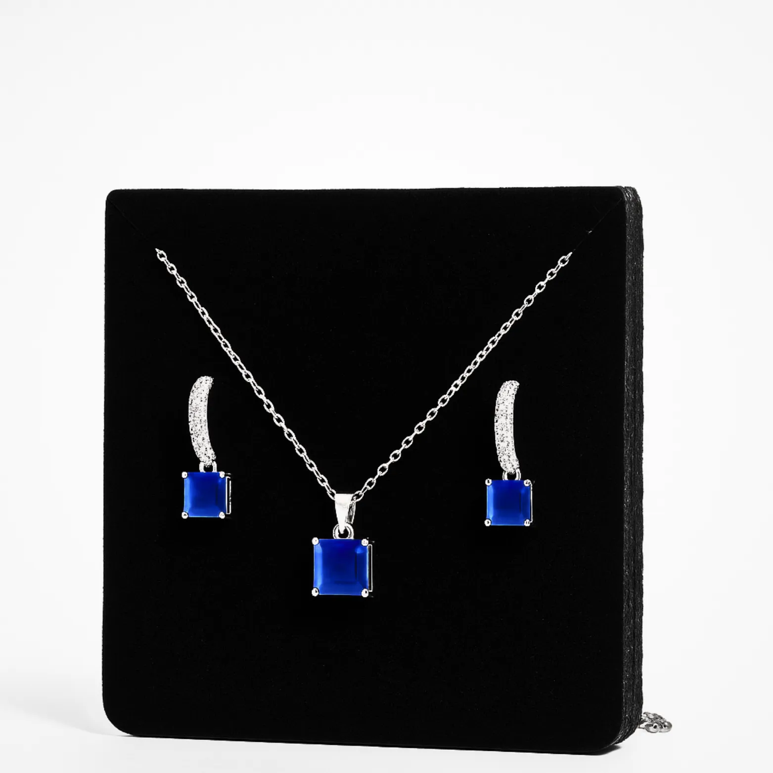 Elegant Sapphire Blue Pendant Set in Silver